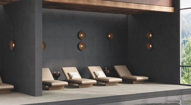 Hospitality rooms scene-spa pool with Sand Garden porcelain tile in charcoal color on wall, deck and waterline.