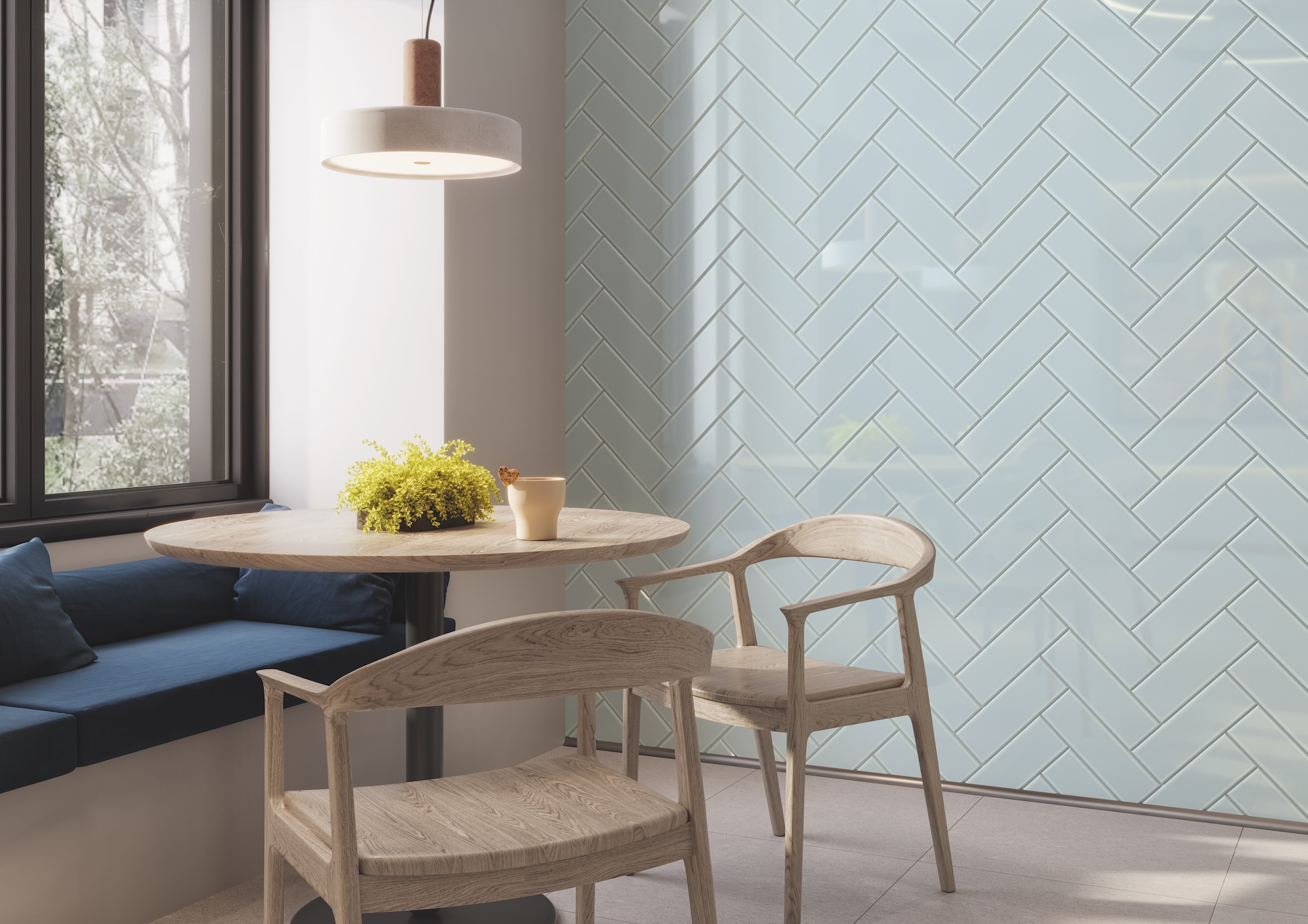Breakfast nook wall with Color Perspectives beveled wall tile in Teal color installed in a herringbone pattern.