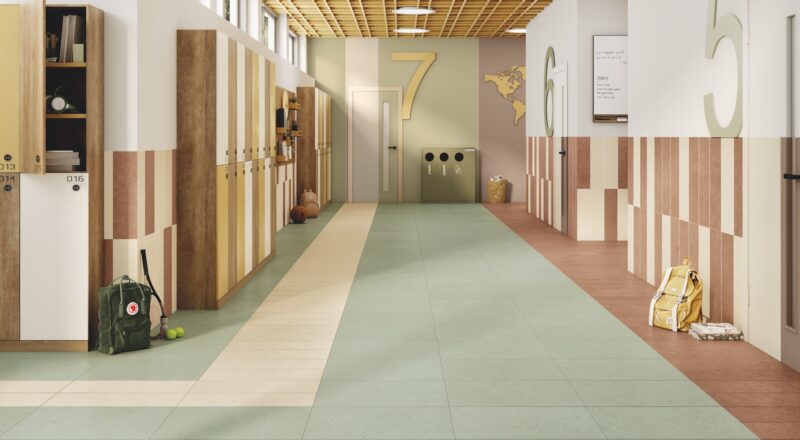 Scholl hallway with porcelain tile on floor and walls
