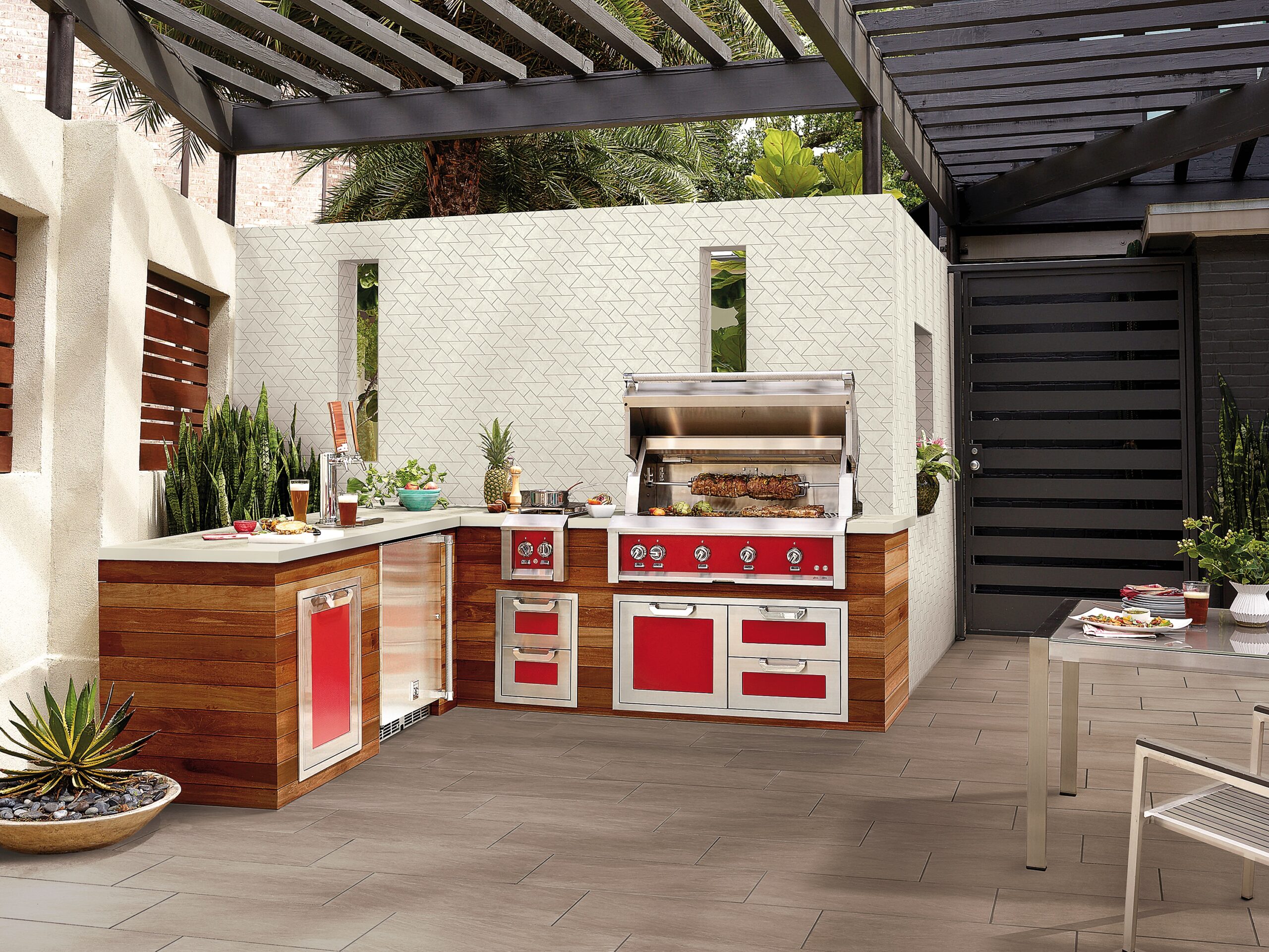 Portugal triangle mosaics on outdoor kitchen wall.