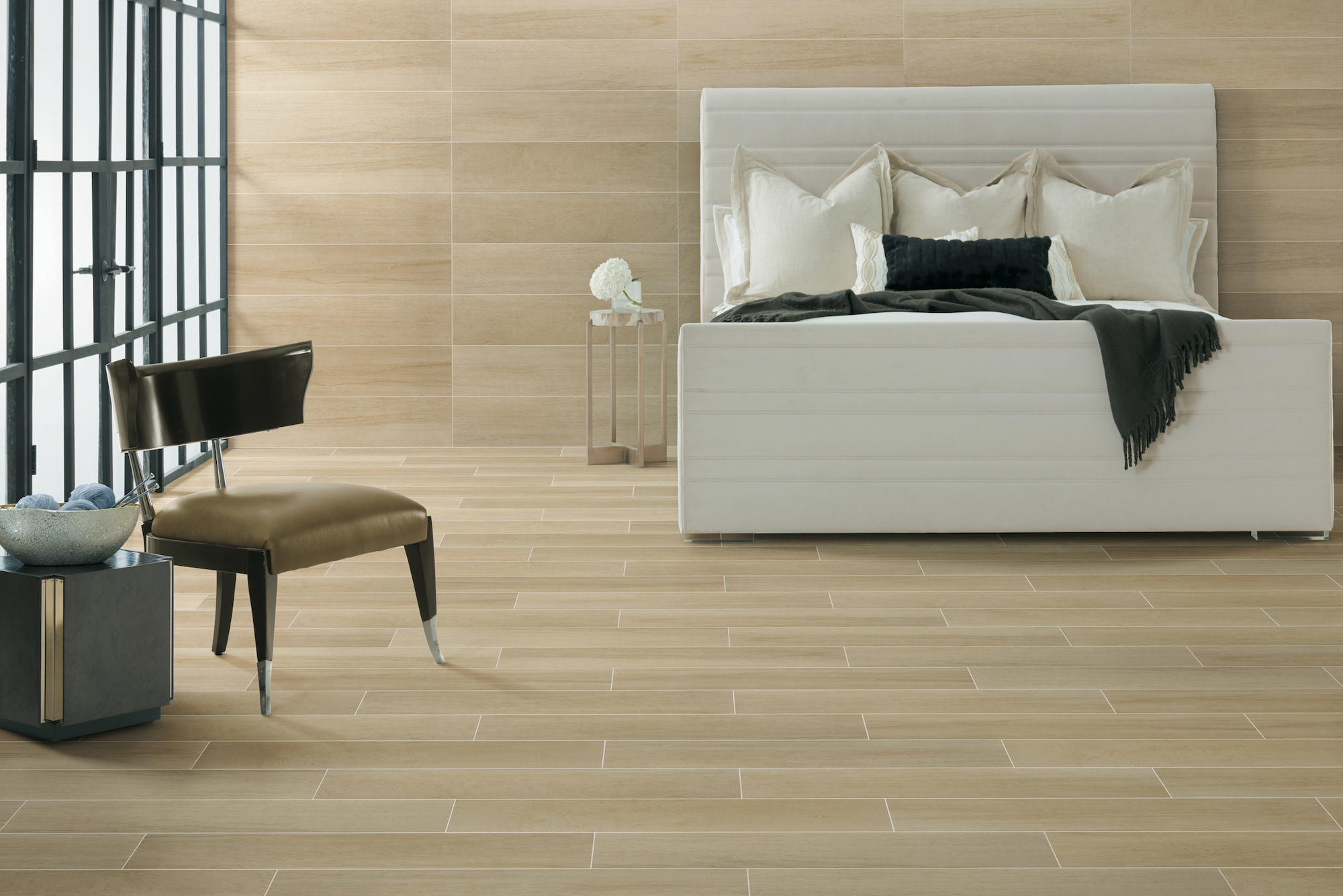 laarge wood look porcelain planks on a horizontal stack pattern on hotel room wall